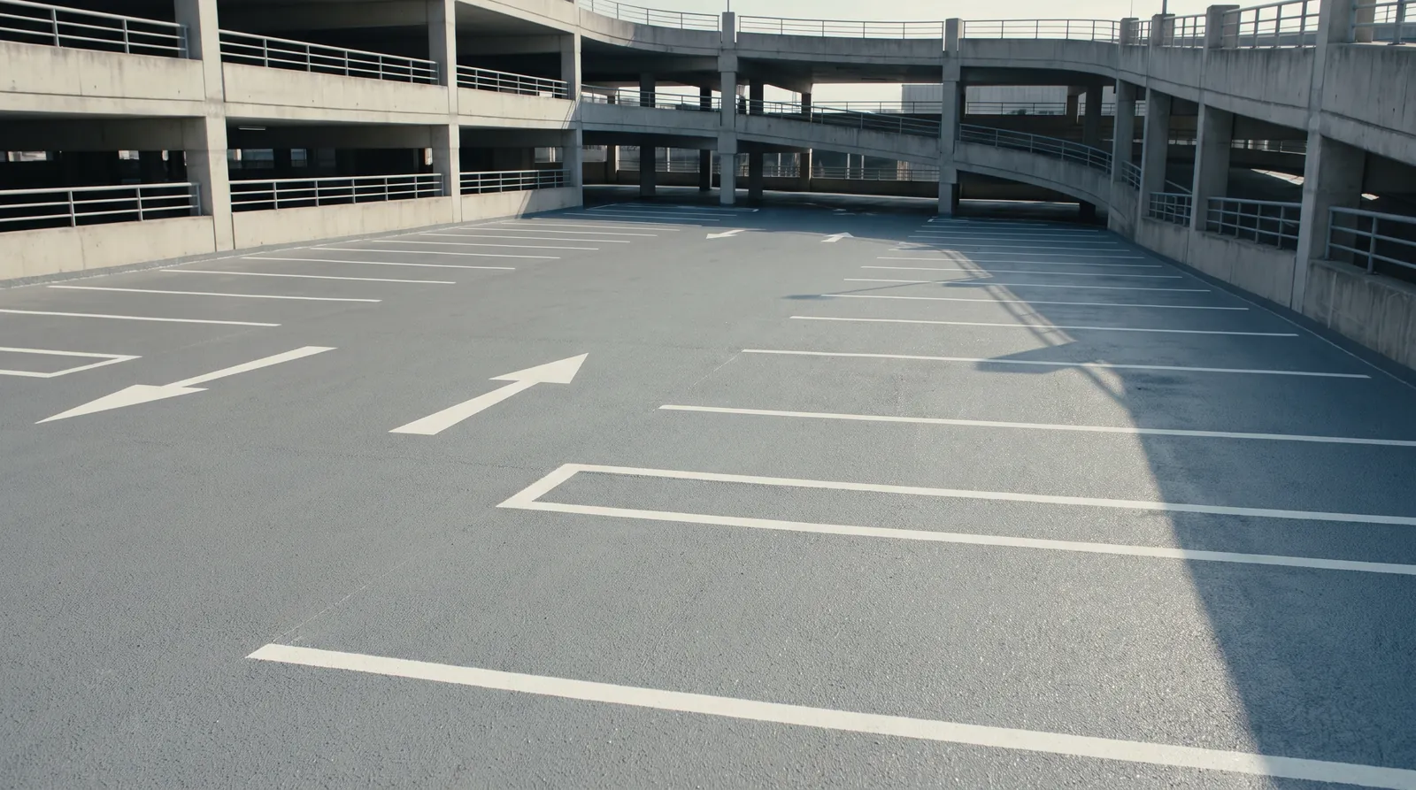 Traffic coating on a concrete parking deck with a trench drain.